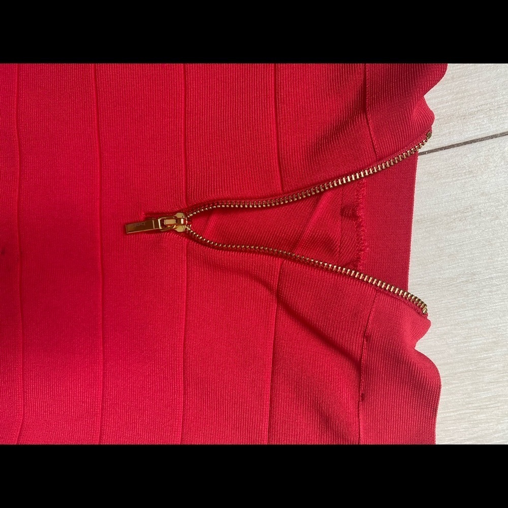 Holiday Ready with this Red knit stretch mini skirt. - Picture 3 of 5
